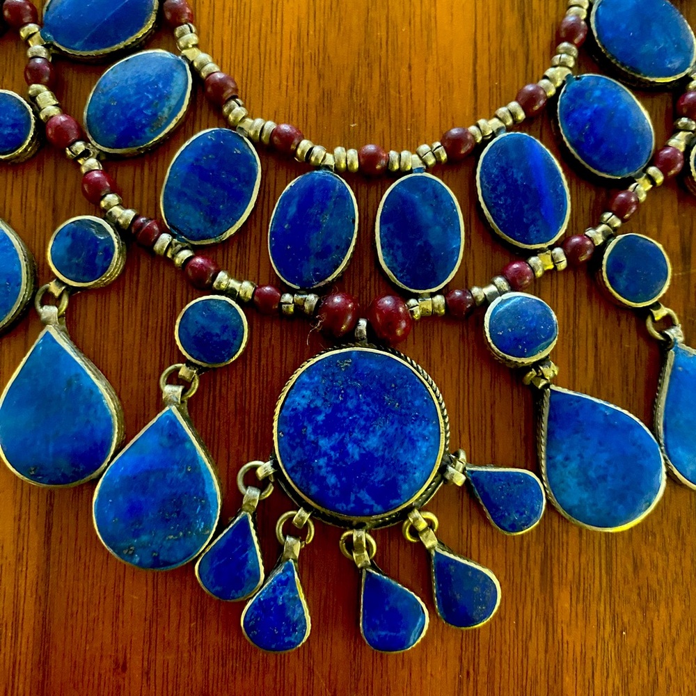 This is a beautiful Lapis and silver necklace it lays perfectly around the neck